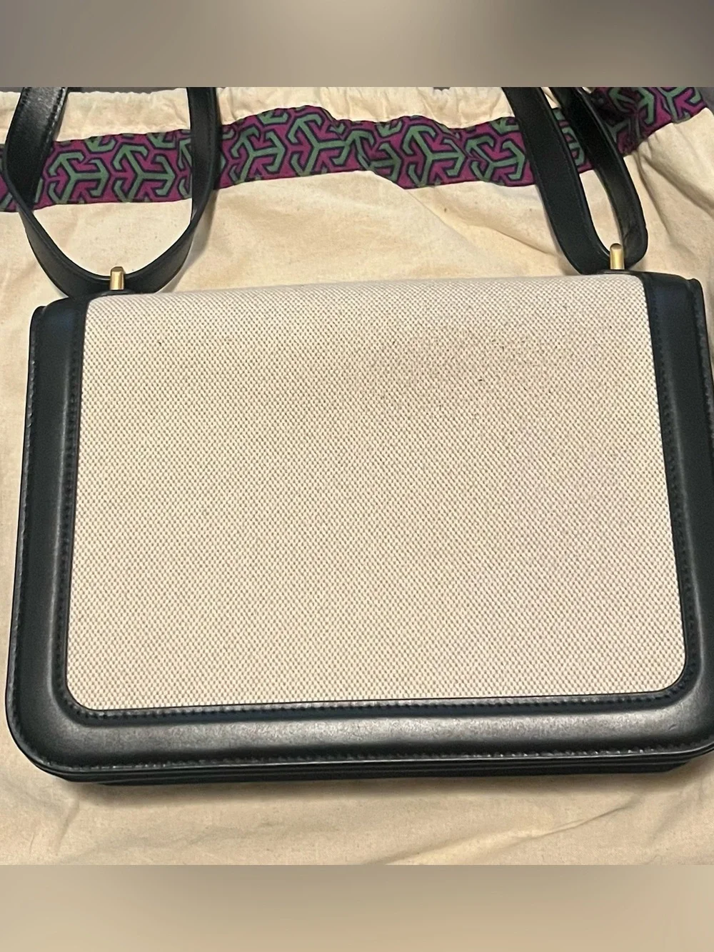 Tory Burch Elenor Two-Tone Leather and Canvas Shoulder Bag in Black and Cream.